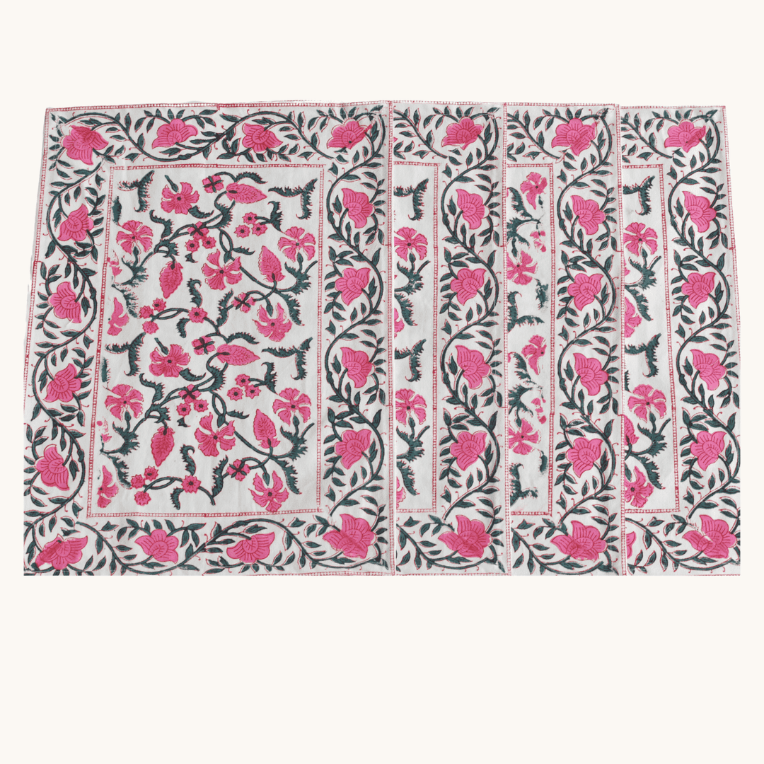 Floral patterned fabric with pink flowers on a white background