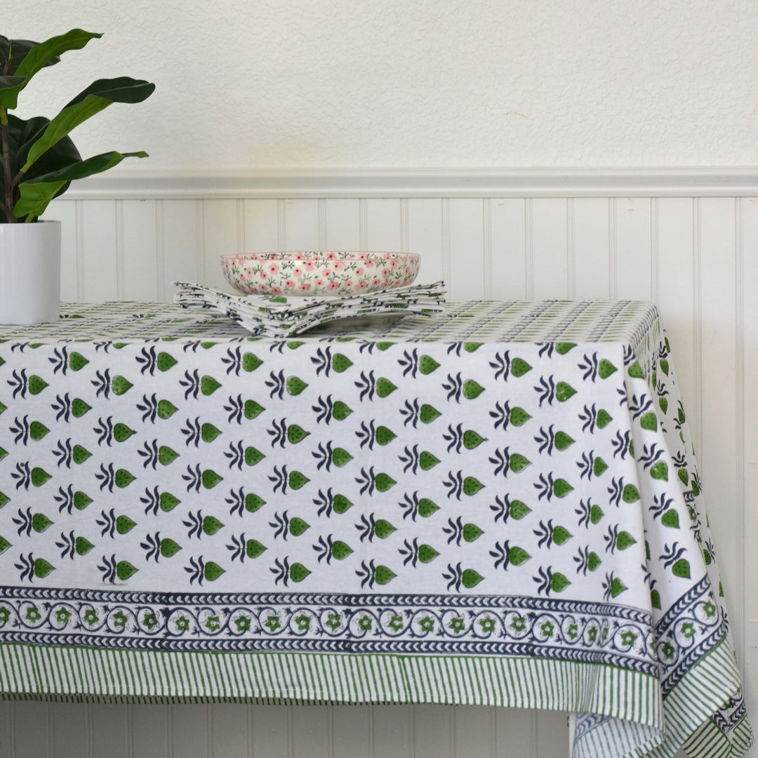 Meadow Picnic handblock printed tablecloth styled with floral bowls and coordinating napkins