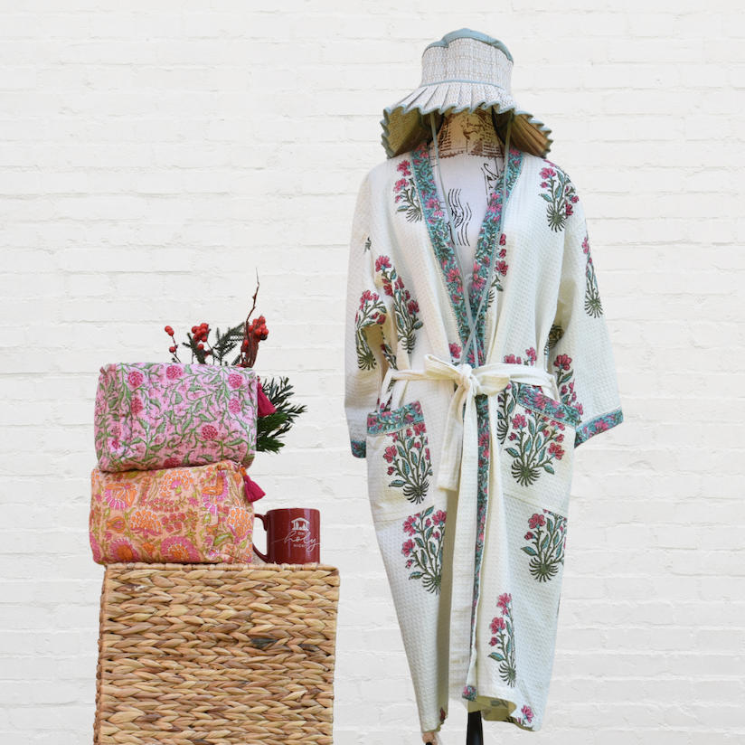  Women’s bath robes, women’s travel pouches, premium women’s products