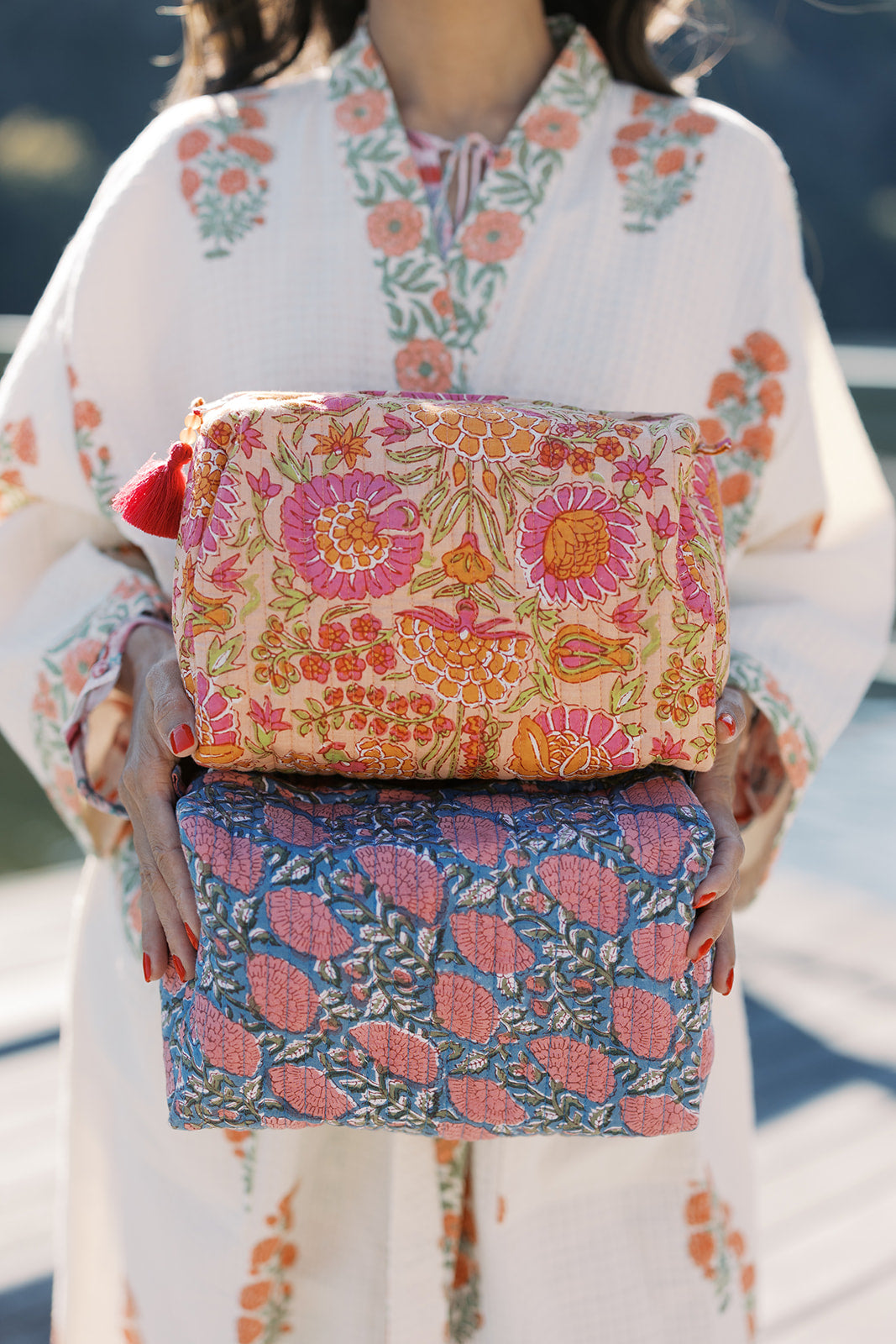  Women’s bath robes, women’s travel pouches, premium women’s products