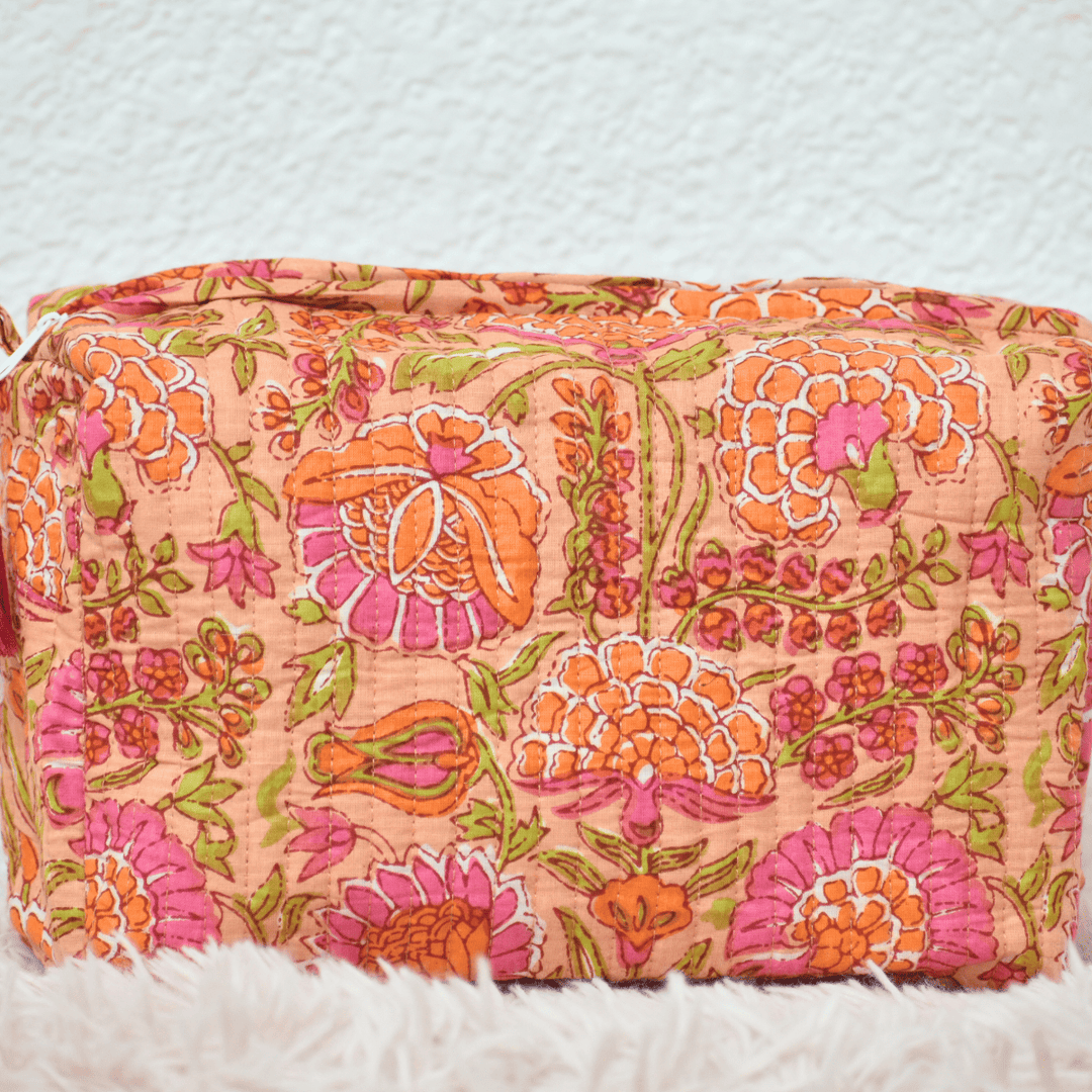 Floral patterned pouch on a white background