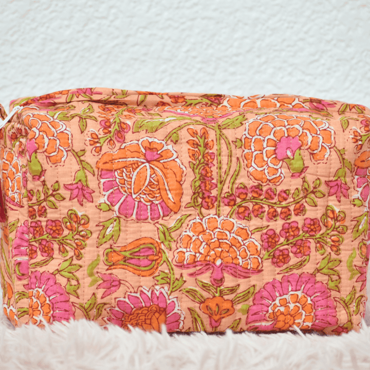 Floral patterned pouch on a white background