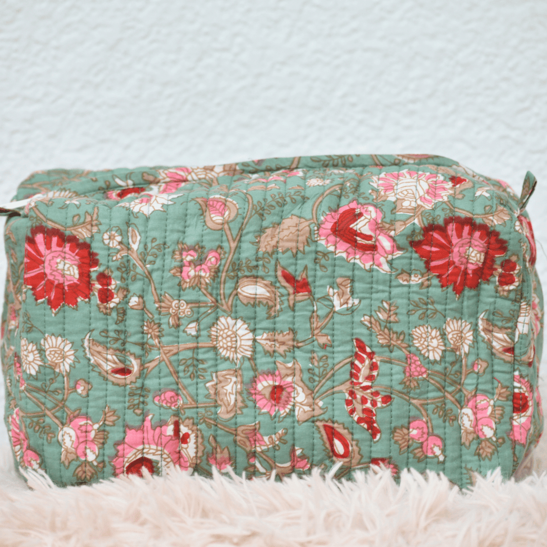 Floral patterned pouch on a textured surface
